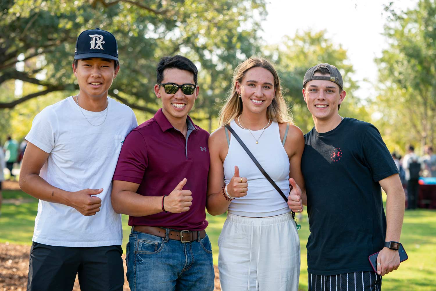 Texas A&M Students posing for a photo at 91Ƶ Park